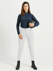 Rigmor ridbyxa med silikongrepp vid knäna, slim fit-passform och vattenavvisande material. Snabbtorkande och UV-skyddad, tillgänglig i fyra färger.